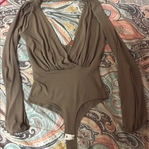 Never been worn bodysuit